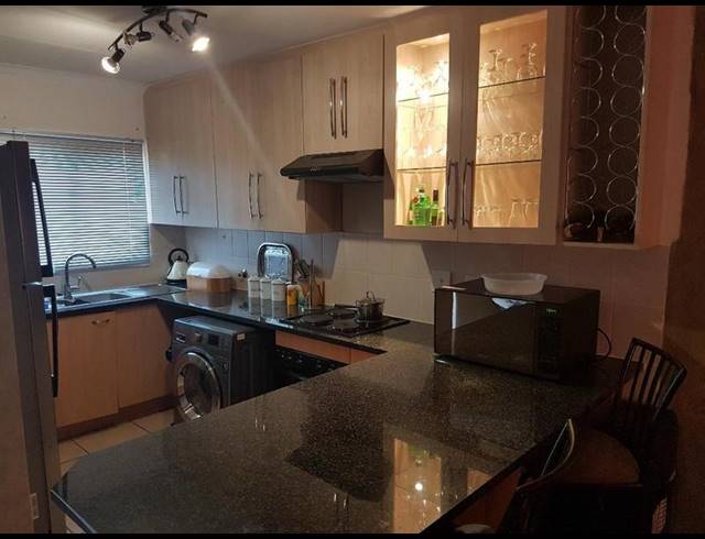 2 BEDROOM TOWNHOUSE FOR SALE IN ROOIHUISKRAAL NORTH